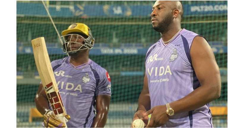 KKR players discussing team strategy during practice session before IPL match