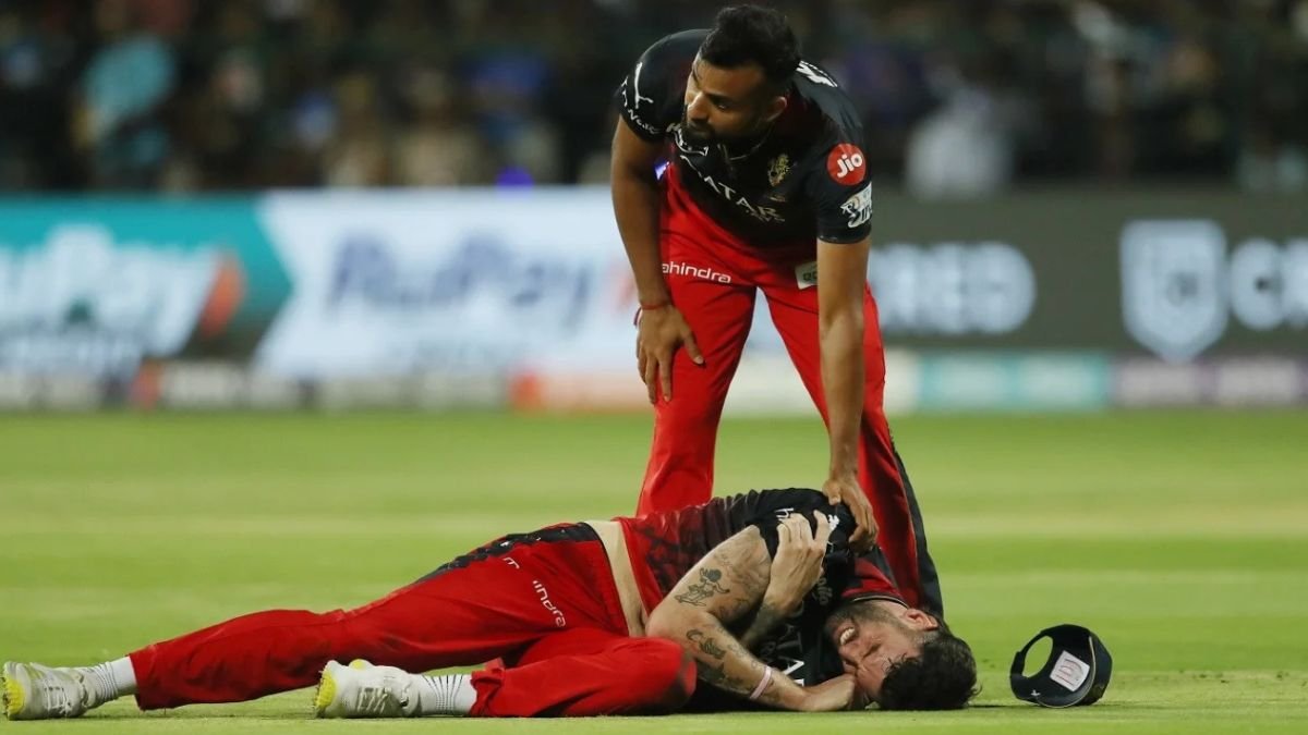 IPL player receiving medical attention during cricket match